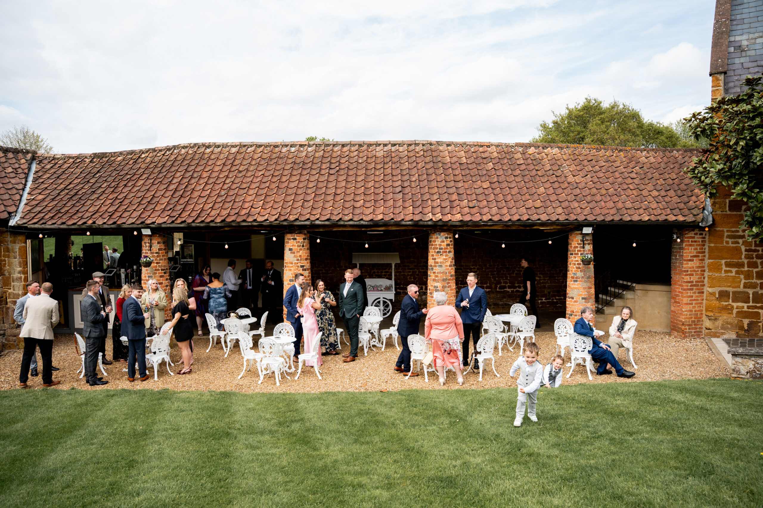 outside terrace at the barns at hunsbury hill at a magical barn wedding